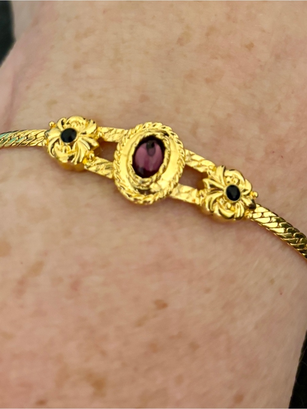 Avon Gold-Tone Herringbone Bracelet with Purple Center and Black Accents